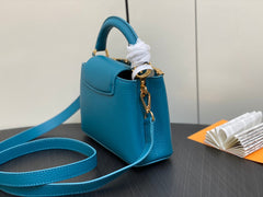 CAPUCINES MINI 21 BLUE TAURILLON GOLD HARDWARE