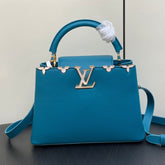 CAPUCINES BB 27 BLUE TAURILLON GOLD HARDWARE