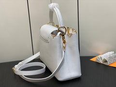 CAPUCINES MM 31 WHITE TAURILLON GOLD HARDWARE