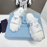 MONOLITH SLIPPER SANDALS IN WHITE RUBBER