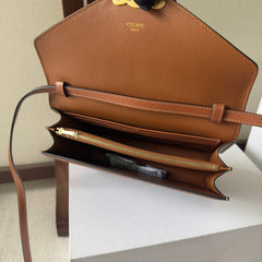CELINE 25S WALLET MARGO 22MM IN BLACK TRIOMPHE CANVAS AND BROWN CALFSKIN