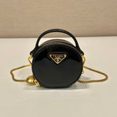 MINI ROUND BAG 8 IN BLACK GLOSSY CALFSKIN GOLD HARDWARE