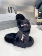 BALENCIAGA 25S FUR SLIPPERS IN BLACK FAUX SHEARLING