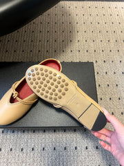 BOTTEGA VENETA 26S FLAT MULES IN BEIGE LAMBSKIN