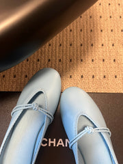 BOTTEGA VENETA 26S FLAT MULES IN BLUE LAMBSKIN