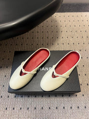 BOTTEGA VENETA 26S FLAT MULES IN CREAM WHITE LAMBSKIN