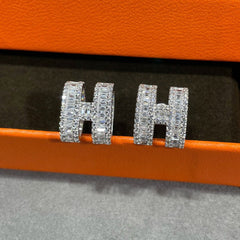 H STUD EARRINGS WITH SILVER DIAMONDS