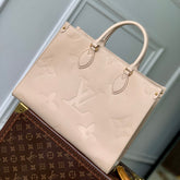 ONTHEGO MM 35 IN BLUSH PINK MONOGRAM CALFSKIN
