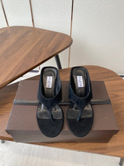 ALAIA WEDGE THONG SANDALS 25S IN BLACK SUEDE