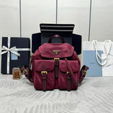 PRADA 25S RE-EDITION 1978 SMALL BACKPACK 28 IN BURGUNDY RE-NYLON