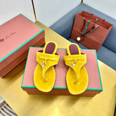 FLIP FLOPS IN YELLOW SUEDE AND HARDWARE SILVER