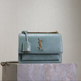 YSL 25S SUNSET MEDIUM 22 IN LIGHT BLUE CROCODILE-EMBOSSED CALFSKIN GOLD HARDWARE