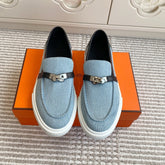 HM 25S SLIP-ON IN SKY BLUE CANVAS AND BLACK LAMBSKIN WITH SILVER HARDWARE