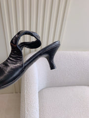 BALENCIAGA 25S HIGH SLINGBACK 35 MM IN BLACK LAMBSKIN WITH GOLD HARDWARE