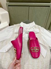 FLAT MULES IN DEEP PINK SMOOTH CALFSKIN GOLD BUCKLE