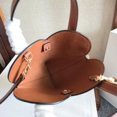 CELINE 25S TEEN COEUR BAG 19 MM IN BLACK TRIOMPHE CANVAS AND TAN CALFSKIN