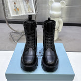 PRADA 25S WARRIOR BOOTS IN BLACK CALFSKIN