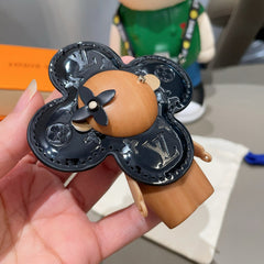 LV KEYCHAIN IN BLACK CALFSKIN AND WOOD