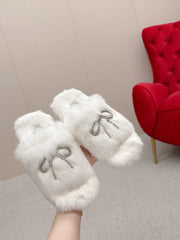 BALENCIAGA 25S SOFT FUR SLIPPERS IN WHITE FUR WITH RHINESTONE BOW