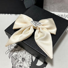 BOW-KNOT HAIR CLIP IN EGG SHELL SILK 358294