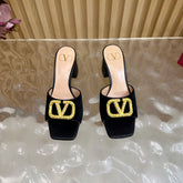VALENTINO 25S HIGH-HEEL MULES 60 MM IN BLACK VELVET AND CALFSKIN WITH GOLD HARDWARE