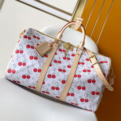 KEEPALL BANDOULIÈRE 45 IN WHITE AND RED CALFSKIN