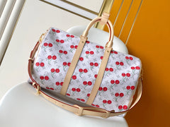 KEEPALL BANDOULIÈRE 45 IN WHITE AND RED CALFSKIN