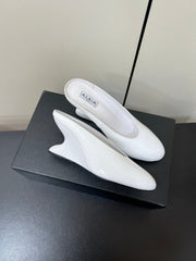 ALAIA WEDGE MULES 25S IN CREAM WHITE LAMBSKIN