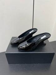 ALAIA WEDGE MULES 25S IN BLACK LAMBSKIN