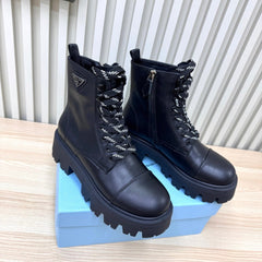 PRADA 25S MONOLITH BOOTS IN BLACK CALFSKIN