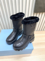 PRADA 25S MARTIN BOOTS IN BLACK CALFSKIN FUR-LINED