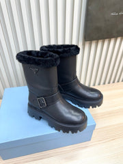 PRADA 25S MARTIN BOOTS IN BLACK CALFSKIN FUR-LINED