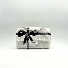CHANEL 25S FLAP BAG 20 CM IN WHITE SEQUINS WITH BLACK BOW