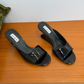 ALAIA WEDGE SANDALS 25S IN BLACK LAMBSKIN