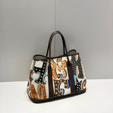 GARDEN PARTY 36 IN MULTICOLOR TOILE H CANVAS DARK BROWN CALFSKIN ABSTRACT GRAPHIC PRINT