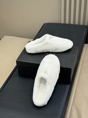 PRADA 25S CLOGS IN WHITE SHEARLING