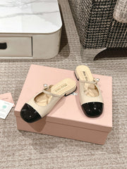 FLAT MULE IN BISQUE BEIGE MIX BLACK PATENT CALFSKIN