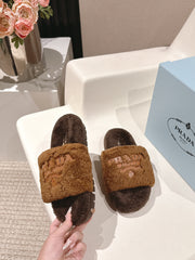 PRADA 25S FLAT MULES IN DARK BROWN RABBIT FUR