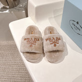 PRADA 25S FLAT MULES IN WARM TAUPE RABBIT FUR