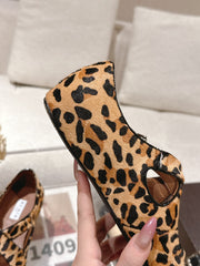 ALAIA 25S CRISS CROSS BALLET FLATS IN LEOPARD SUEDE