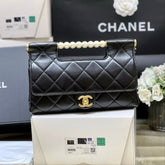 PEARL TOP HANDLE BAG 25 IN BLACK LAMBSKIN GOLD HARDWARE