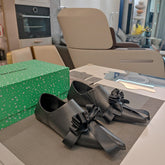 POINTED-TOE FLATS WITH BOW IN BLACK SOFT LAMBSKIN