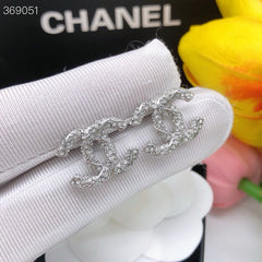 STUD EARRINGS MINI DOUBLE C TWISTED IN SILVER DIAMOND