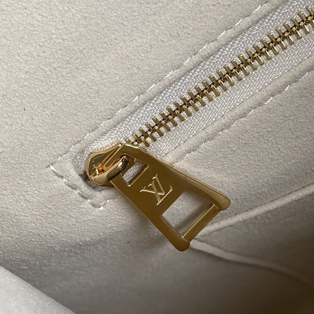 LV ONTHEGO MM 35 CREAM COWHIDE-LEATHER TRIM