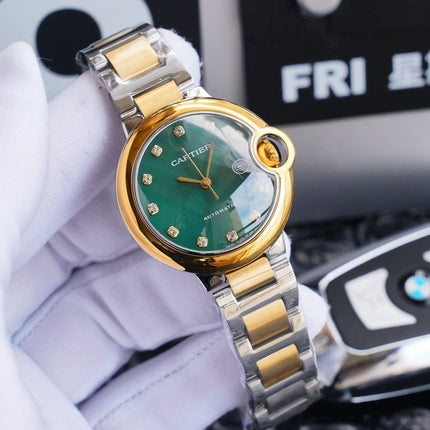 BALLON BLEU 33MM GOLD GREEN DIAL DIAMOND NUMERALS