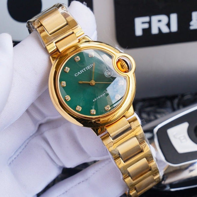 BALLON BLEU 33MM GOLD GREEN DIAL DIAMOND NUMERALS