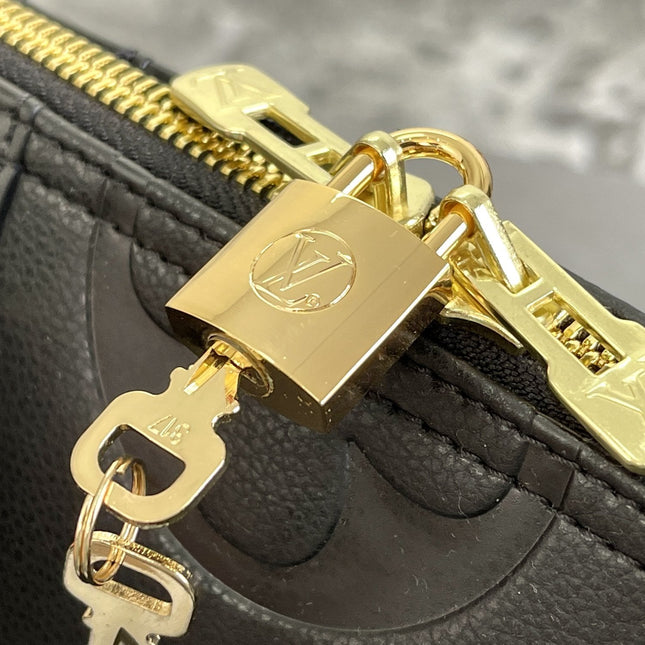 KEEPALL 45 BANDOULIERE MONOGRAM EMPREINTE GIANT