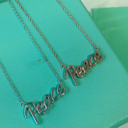 PEACE TEXT PEDANT NECKLACE