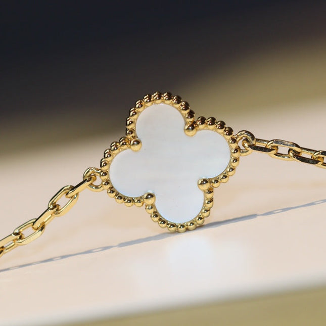 CLOVER 20 MOTIFS WHITE MOP GOLD