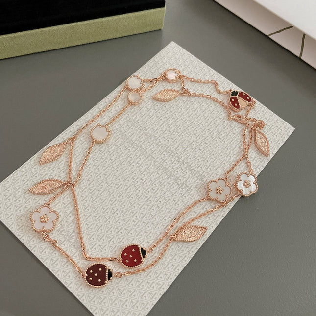 LUCKY SPRING 15 MOTIFS PINK GOLD NECKLACE